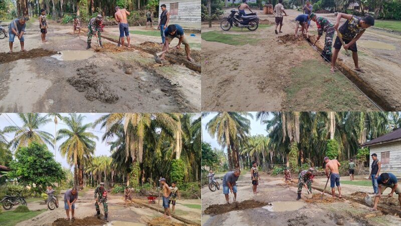 Babinsa Koramil 10/Tanjung Medan Bersama Warga Desa Perlabian Gotong-Royong Membuat Parit